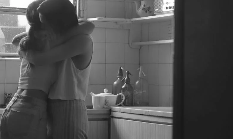 Shadows at the Graduation Party: A Story of Estrangement and Hope